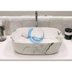 Lavabo sobre encimera marmol blanco